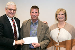 Hank Foley, Curt Elmore and Missouri S&T Chancellor Cheryl B. Schrader.