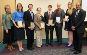 From left: Missouri S&T Chancellor Cheryl B. Schrader, Krista Limmer, Scott Pisarik, Jaime George, Casey Cain, Warner Meeks, Erica Ronchetto and Venkat Allada, vice provost for graduate studies at S&T. Photo provided by the Missouri S&T graduate studies office.
