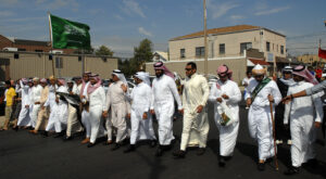 Students representing the Missouri S&T Saudi Student Association walk in the Celebration of Nations parade held annually in September.