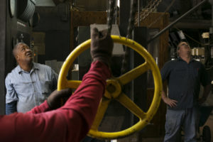 Missouri S&T power plant operators Cliff Walker and Jerry Sekscinski inside the plant.