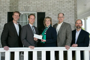 Pictured left to right: Dr. Daryl Beetner, professor of electrical and computer engineering; Jason Brinker, venture manager for ExxonMobil; Missouri S&T Chancellor Cheryl B. Schrader; Dr. Ralph Flori, associate professor of geological  sciences and engineering; and Dr. James A. Drallmeier, Curators' Teaching Professor of mechanical and aerospace engineering.