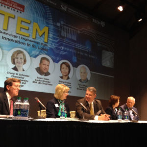 Chancellor Cheryl B. Schrader chats with fellow panelist Kevin Token of BSA LifeStructures prior to the "STEM: Growing Innovation" forum. With Schrader and Token are, from left, Mike Downing, director of the Missouri Department of Economic Development; Dr. Sharon Frazee of Express Scripts; and Dr. Terry Brewer, founder of Brewer Science.