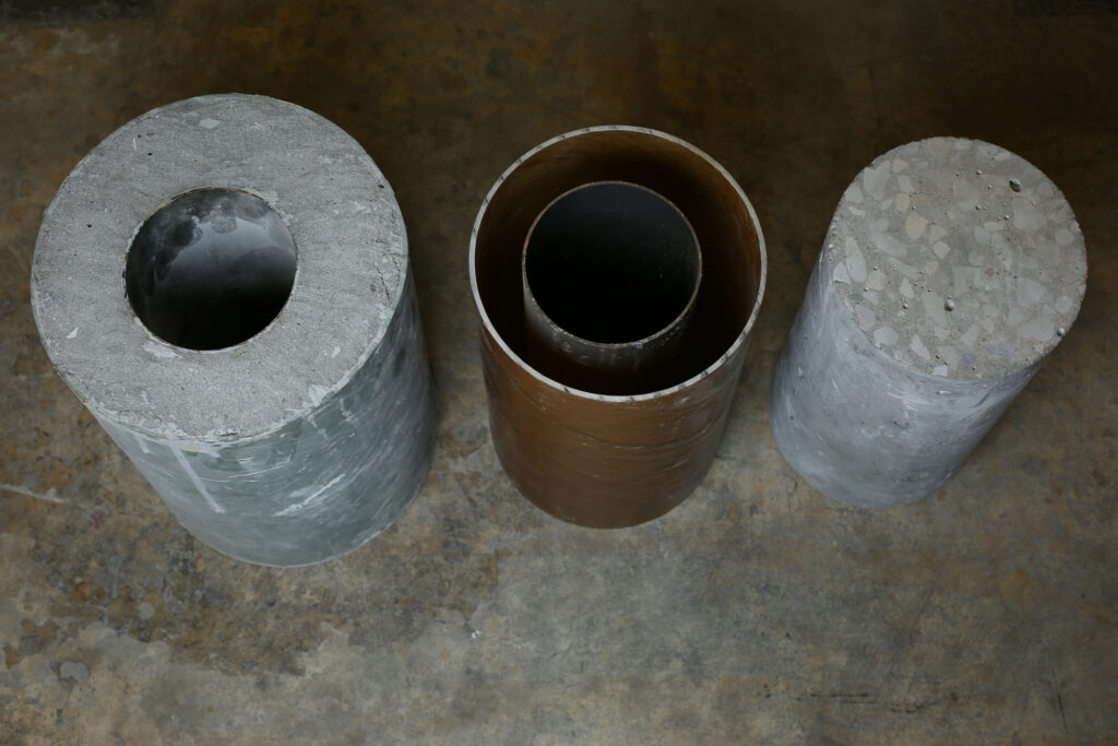 From the left: ElGawady's concrete column, the steel tube and polymer without concrete, and the current standard.