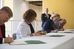 Officials from Missouri S&T and Honeywell Federal Manufacturing & Technologies signed a Master Collaboration Agreement Sept. 15, 2015.