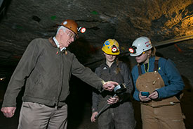 Under the guidance of Dr. Stewart Gillies, Missouri S&T students use a precision air pressure sensor, provided by Doe Run, in the Missouri S&T Experimental Mine. Gilles, left, is pictured with Johanna Jeffryes and Katherine Burke. Photo by Sam O'Keefe/Missouri S&T