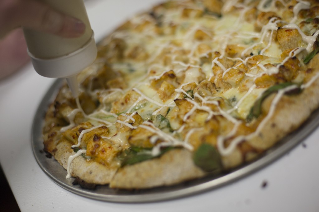 Pulse Pizza's best seller is its Buffalo chicken pizza, cleverly named "Buffalo Rider" after the campy 1970s Western movie of the same name.