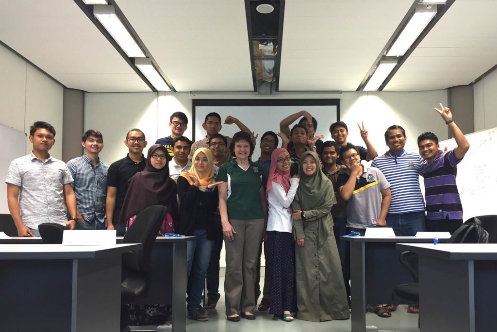Missouri S&T's Shari Dunn-Norman is surrounded by UTP students in March 2015 in Malaysia. She was a guest lecturer in UTP's drilling program, teaching the production module for three weeks.
