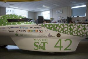 The Solar Car Team unpacks the solar panes for the car after the car was returned following the vinyl decals installation.              Photo by Sam O'Keefe/Missouri S&T