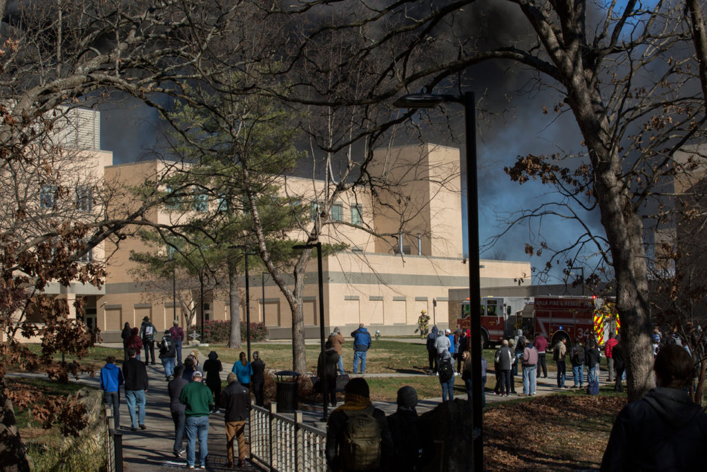 Emerson Electric Hall is vacated as local emergency response teams extinguish a fire on the roof in Rolla, MO on Thursday Dec. 8, 2016. Sam O'Keefe/Missouri S&T