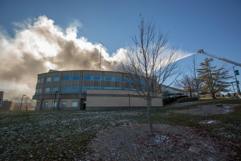 Emerson Electric Hall is vacated as local emergency response teams extinguish a fire on the roof in Rolla, MO on Thursday Dec. 8, 2016. Sam O'Keefe/Missouri S&T