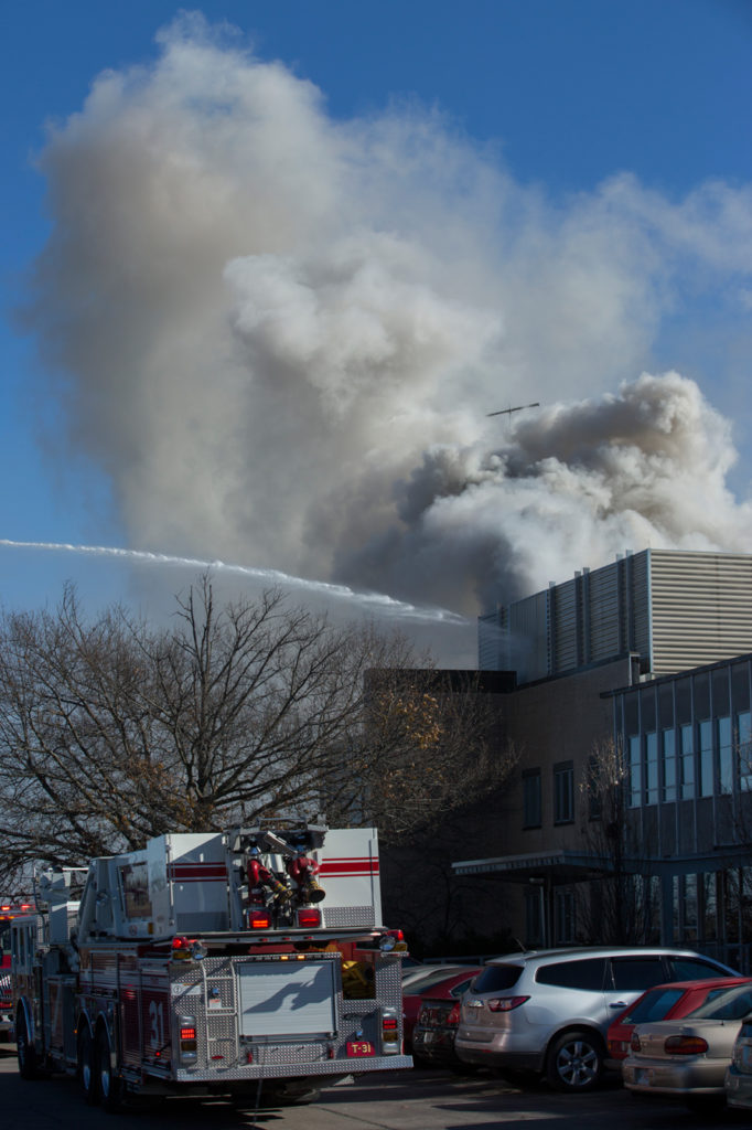 Emerson Electric Hall is vacated as local emergency response teams extinguish a fire on the roof in Rolla, MO on Thursday Dec. 8, 2016. Sam O'Keefe/Missouri S&T