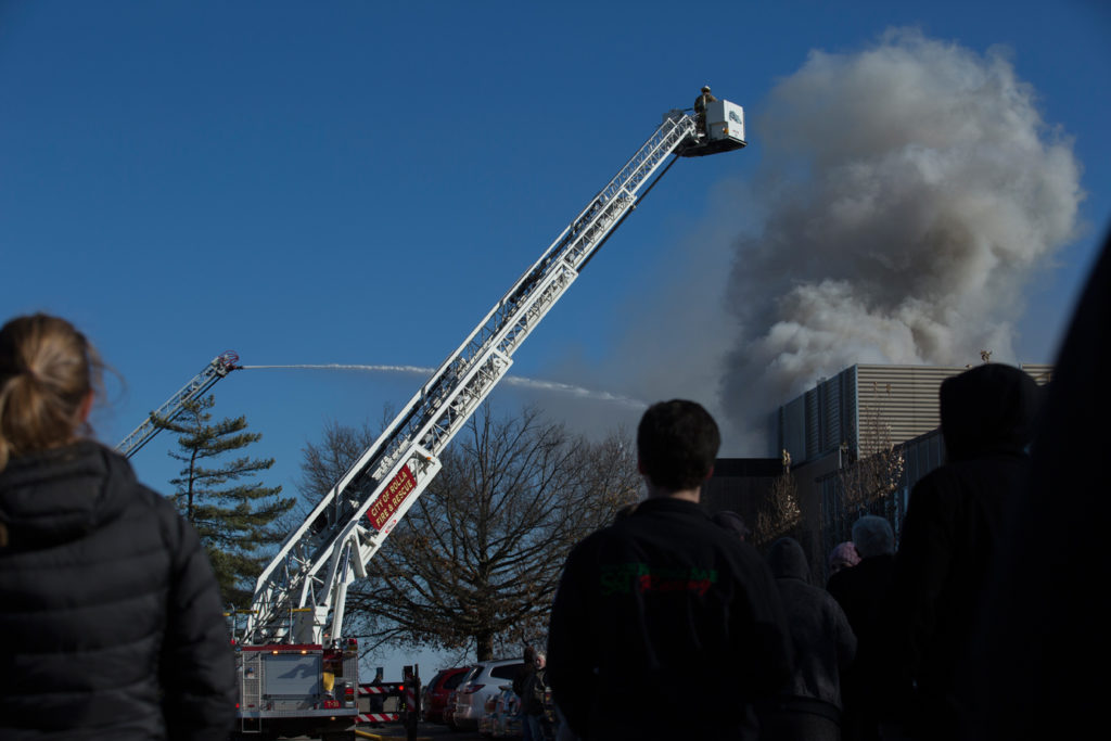 Emerson Electric Hall is vacated as local emergency response teams extinguish a fire on the roof in Rolla, MO on Thursday Dec. 8, 2016. Sam O'Keefe/Missouri S&T
