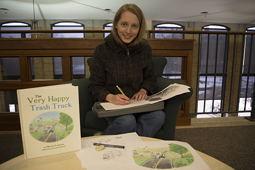 Alumna draws, talks ‘trash’