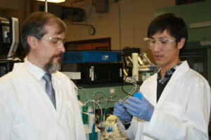Dr. Vadym Mochalin (left) and visiting researcher Atsushi Kume (DAICEL Corp.) working in the lab.