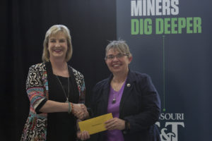 Missouri S&T Chancellor Cheryl B. Schrader presents Dr. Mary Reidmeyer with the first Dr. Elizabeth Cummins Women's Advocate Award. Photo by Sam O'Keefe