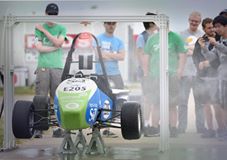 Missouri S&T's Formula Electric car during the "rain" test, which helps ensure the car is save for both the driver and the pit crew in wet weather.