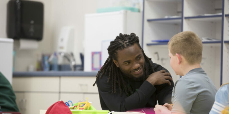 On top of his game, S&T running back also gives back