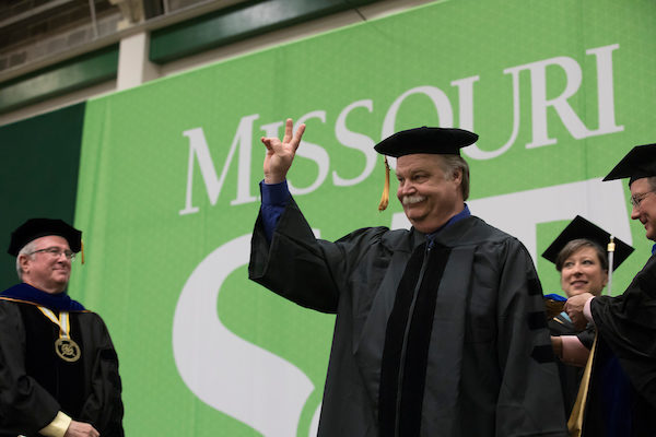 Rock-and-roll grandpa earns doctoral degree for research on using desert shrub as asphalt recycling agent