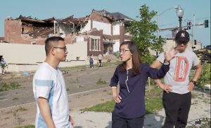 Dr. Guirong (Grace) Yan discusses damage from the Jefferson City tornado with Ph.D. student Zhi Li. To her right is Ph.D. student Yi Zhao. Photo by Terry Barner/Missouri S&T.
