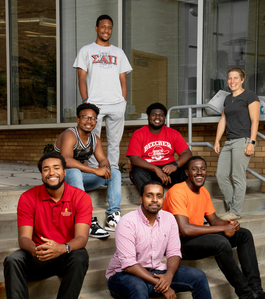 Summer Engineering Research Academy (SERA) participants, front row, from left: Langston Hines of Tuskegee University, Ahmed Osmand of Tennessee State University and Sam Wreh of Tennessee State University; back row, from left, Joshua Campbell, Chris Buford II (standing) and Branden Currie, all of Tennessee State, and Dr. Kelley R. Wilkerson, assistant teaching professor of materials science and engineering at S&T and SERA program director. Photo by Tom Wagner/Missouri S&T, ©2019 Missouri S&T.