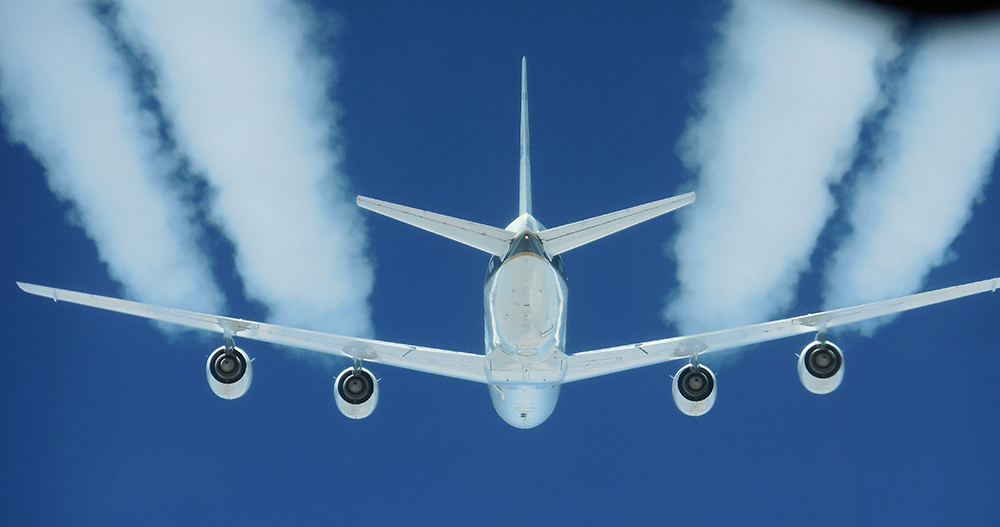 A DC-8's four engines burning either JP-8 jet fuel or a 50-50 blend of JP-8 and renewable alternative fuel. Credits: NASA/SSAI Edward Winstead.