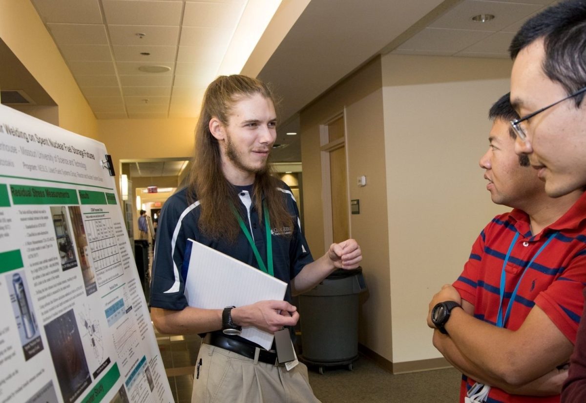 Joshua Rittenhouse at a poster presentation