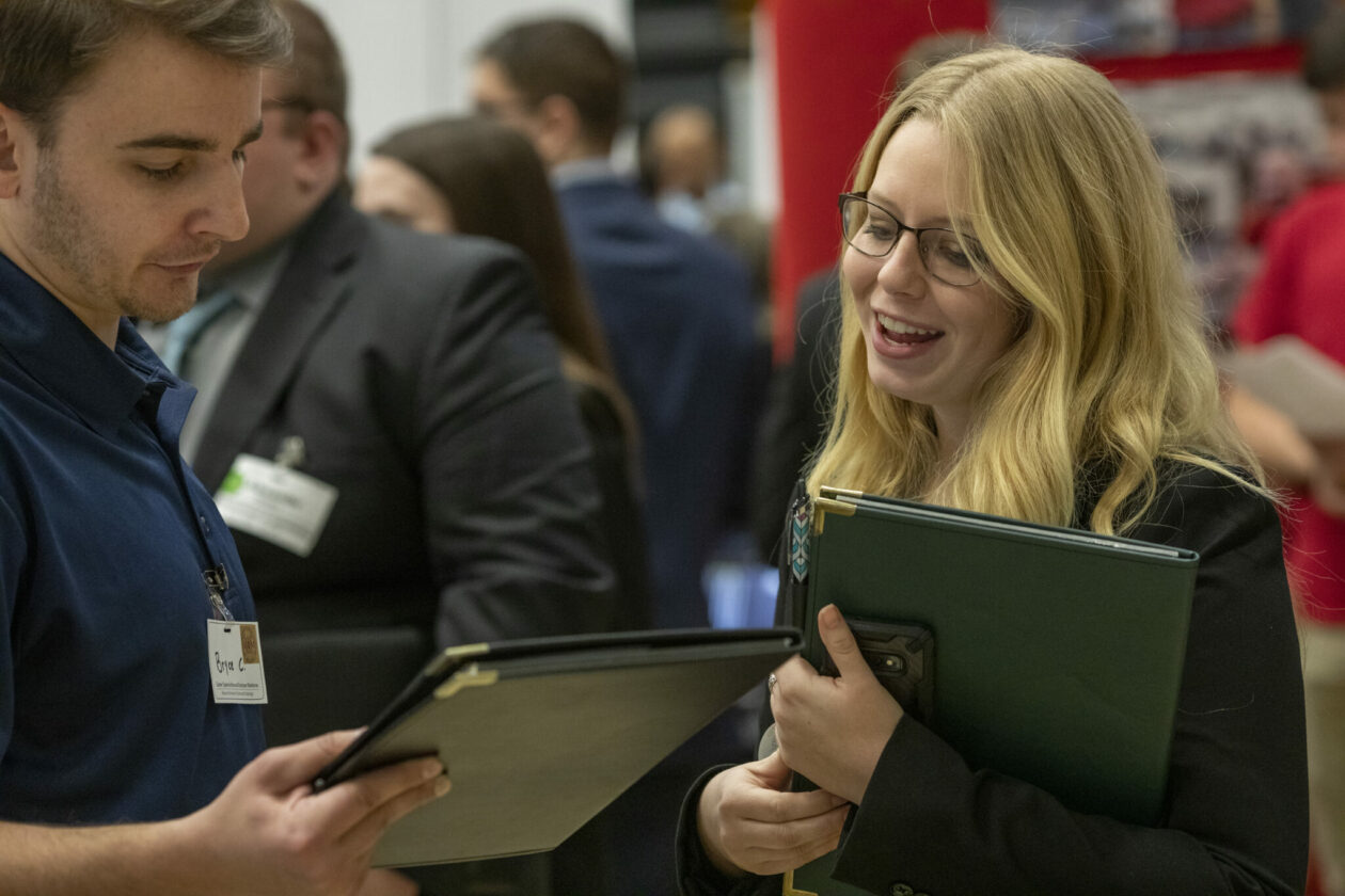 Photo of student talking with business representative at Missouri S&T Career Fair