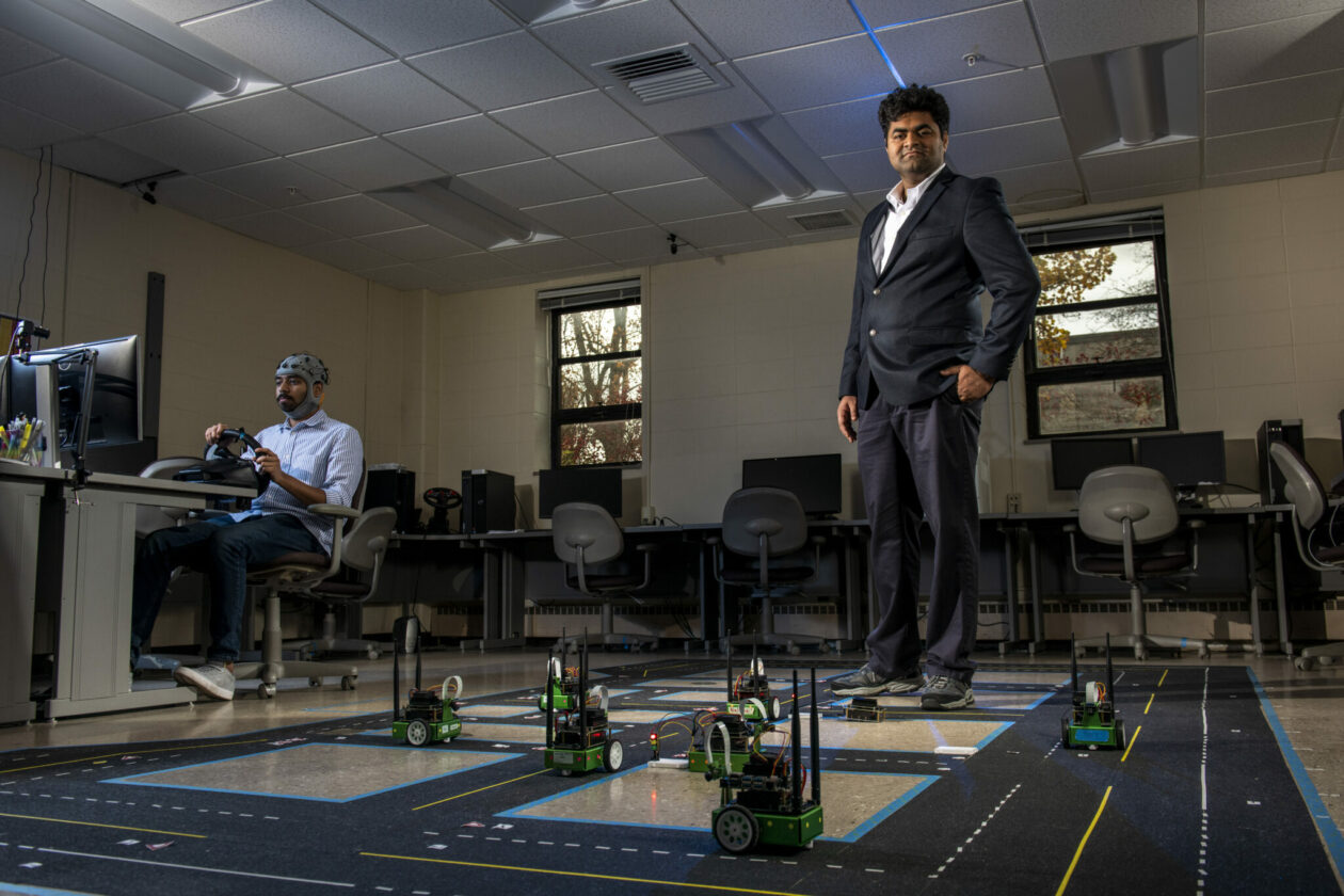 Dr. Sid Nadendla and grad student in the lab
