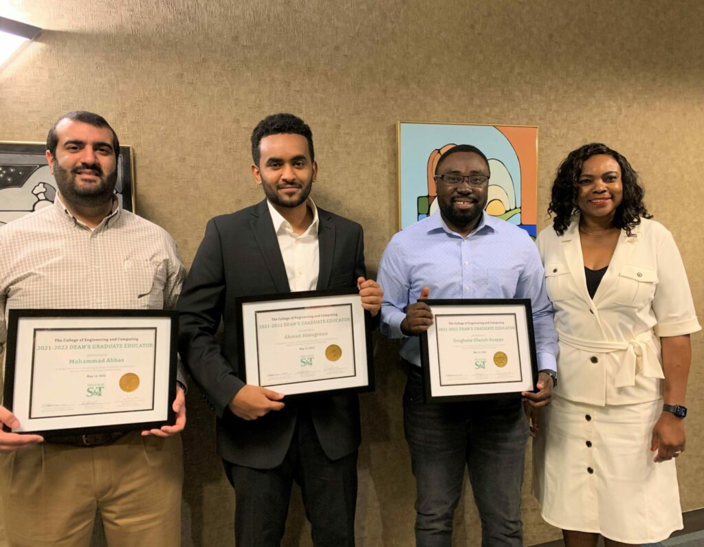 Photo of the three winners of the dean's graduate educator awards, along with the associate dean of academic affairs.