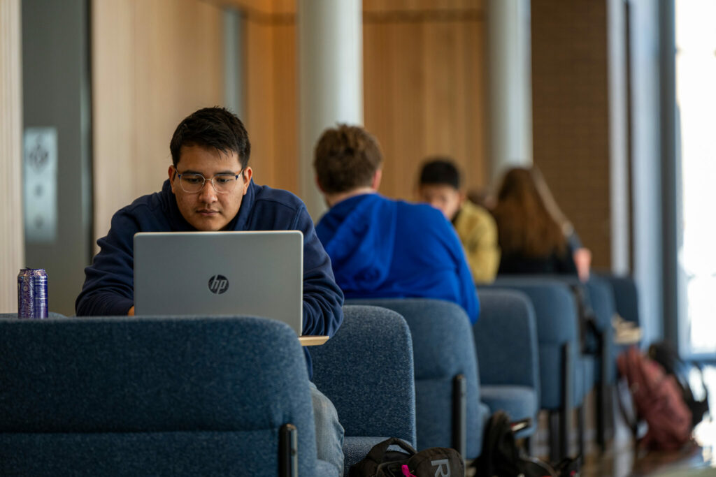 Student on laptop in Innovation Lab