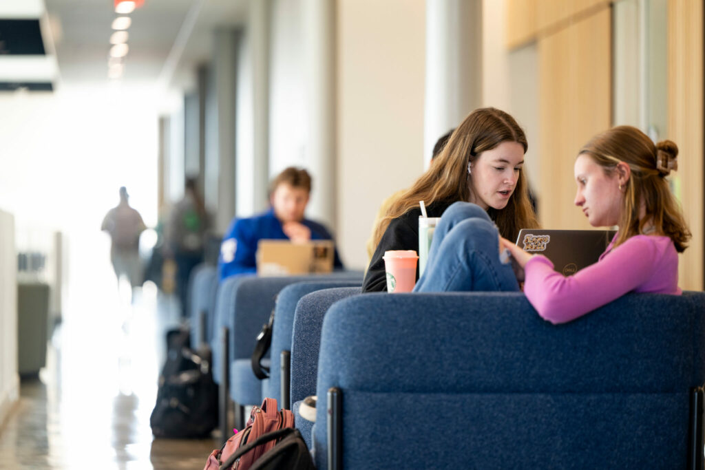 Students in booths at Innovation Lab