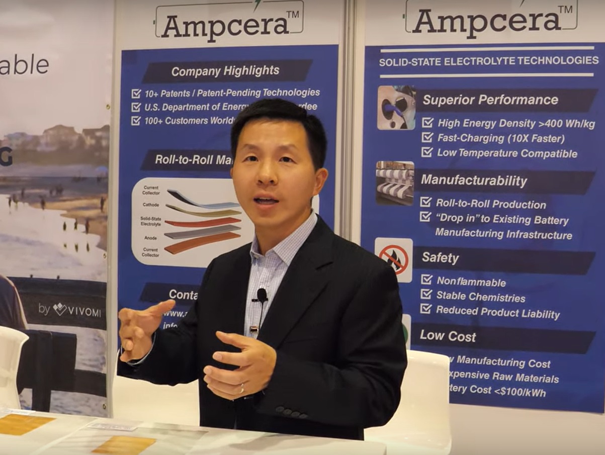 Dr. Sumin Zhu discusses his company’s battery technology at a tradeshow. Photo courtesy of Nicolas Charbonnier — youtube.com/charbax.