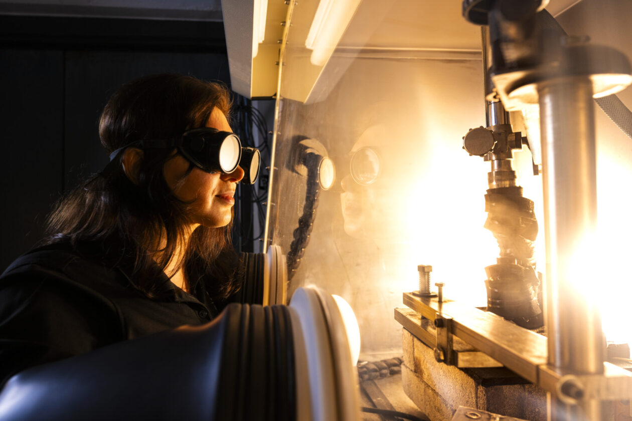 Dr. Arezoo Emdadi monitors a plasma arc welding experiment in a controlled-atmosphere glove box. Photo by Michael Pierce/Missouri S&T.