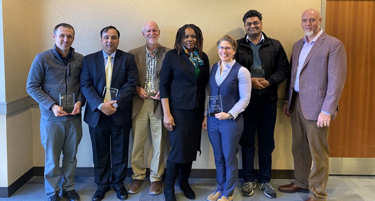 From left, Dr. Jeremy Maurer, Dean’s Scholar Award recipient; Dr. Sanjay Tewari, Dean’s Educator Award recipient; Dr. Douglas Carroll, Dean’s Educator Award recipient; Dr. Francca Oboh-Ikuenobe, the college’s associate dean for academic affairs; Dr. Kelley Wilkerson, Dean’s Educator Award recipient; Dr. Venkata Sriram Siddhardh Nadendla, Dean’s Scholar Award recipient; and Dr. David Borrok, the college’s vice provost and dean. Photo by Stephanie Lewis/Missouri S&T.
