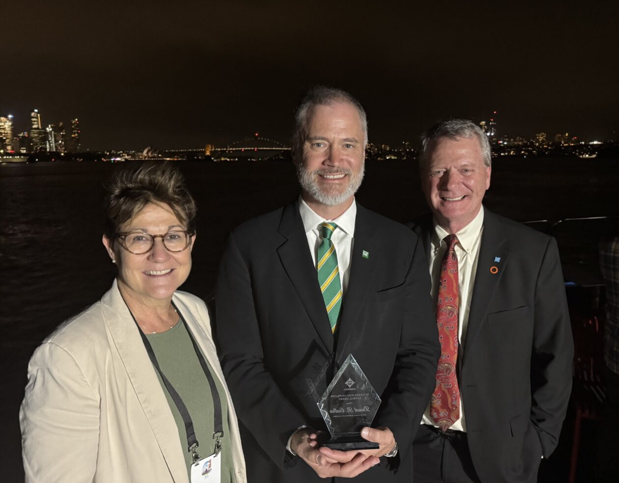 Dr. Daniel Oerther, center, poses for a photo with P. J. Boardman, global director of STEM outreach and workforce development at MathWorks, left, and Dr. Michael Milligan, CEO of ABET, at the World Engineering Education Forum in Sydney, Australia. Mathworks and ABET are sponsors of the Fraser Award that Oerther received. Photo courtesy of Oerther.