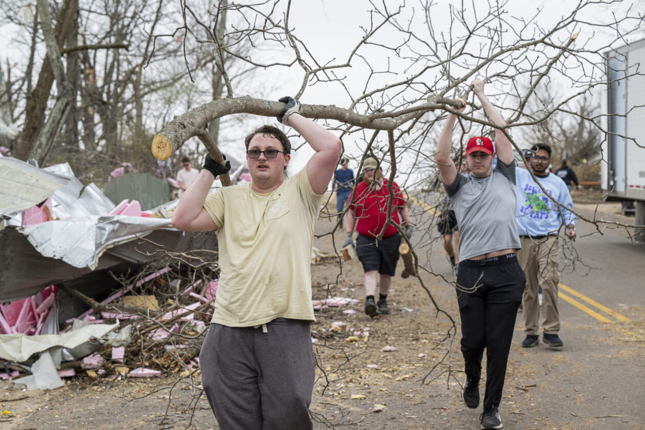 Missouri S&T students removing debris. Photo by Blaine Falkena/Missouri S&T.