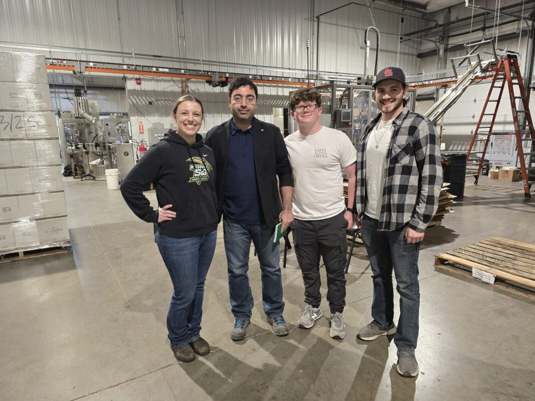 Kendra Wood, left, provided a tour of St. James Winery to Dr. Hossein Abedsoltan, Caleb Long and Thomas Niebrugge to support their research on wine fermentation. Photo courtesy of Abedsoltan.