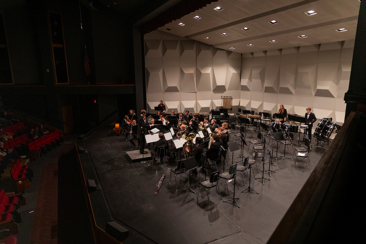 Students perform onstage at Leach Theater during a 2023 Wind Symphony concert.