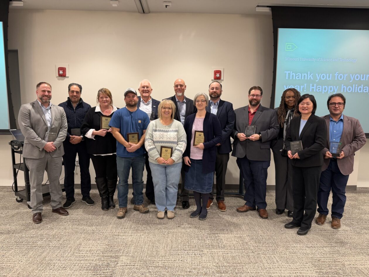 From left, Dr. Phillip Mulligan, Dr. Nicolas Libre, Theresa Brown, Kyle Stagner, Dr. Joseph Smith, Shelly Morgan, Dr. David Borrok, vice provost and dean of the college, Cherie’ Lewis, Dr. Stephen Haug, Dr. Joshua Schlegel, Dr. Francisca Oboh-Ikuenobe, associate dean for academic affairs, Dr. Jenny Liu and Dr. Taghi Sherizadeh. Photo by Stephanie Lewis/Missouri S&T